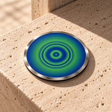 Sirius Pocket Portal by The Prism with concentric blue and green waves and an Alchemical Silver Mirror finish.
